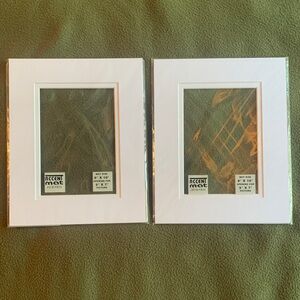 NIP Nicole acid free white accent mats. 8” x 10” opening for 5” x 7” picture.